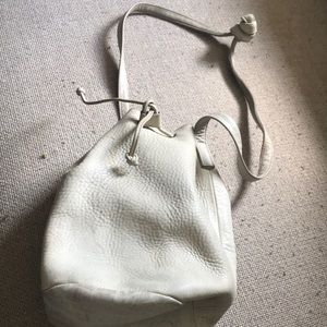 Cream colored Baggu leather drawstring purse